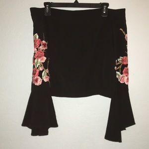 Off the shoulder top with floral embroidery!